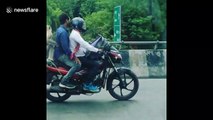 Tail that bike! Monkey spotted enjoying motorcycle ride in India