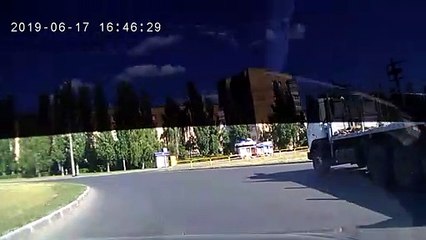 Cyclists Collide While Crossing a Russian Road