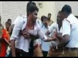 இளைஞரை தாக்கிய டிராஃபிக் போலீஸார்