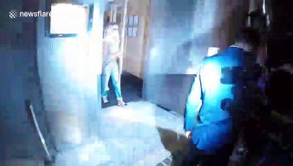 Pop star Rita Ora illuminated by press in London's Mayfair