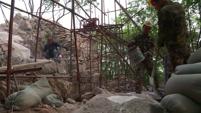 Mules, tools and old bricks: Rebuilding China's Great Wall
