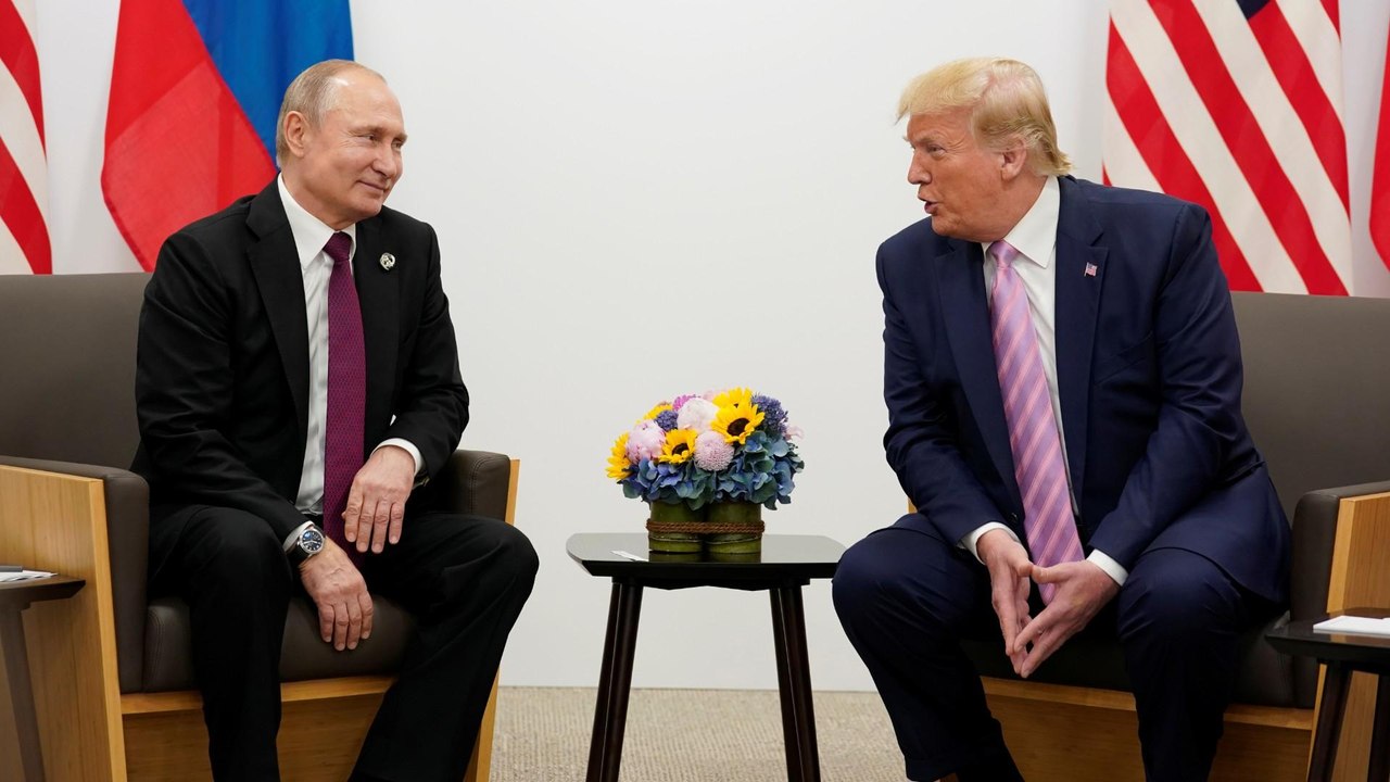 Trump tells Putin 'don't meddle' in US elections