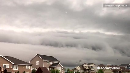 Monster shelf cloud envelops city