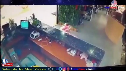 Shocking moment a baby falls down escalator in Chinese shopping mall -