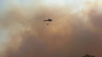 Helicoptero trabaja en la extinción del incendio de Toledo