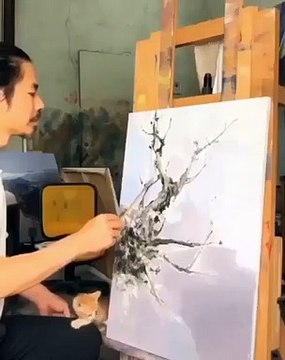 Ce chat est un vrai artiste peintre. Admirez son oeuvre !