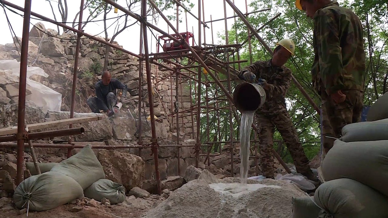 Mules, tools and old bricks: Rebuilding China's Great Wall