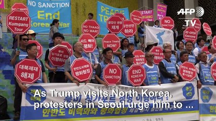 South Koreans hold rallies as Trump visits Korean Peninsula