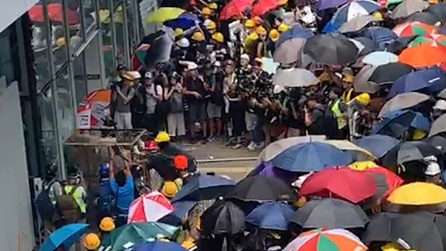 Anti-extradition bill protesters try to storm Hong Kong’s legislature on tense handover anniversary