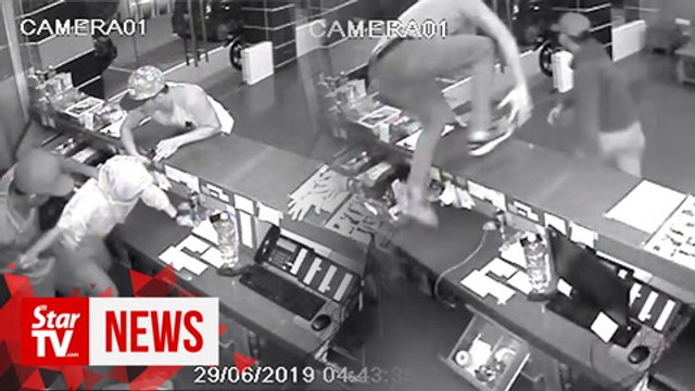 Manhunt on for hotel robbers