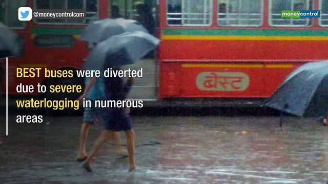 Mumbai crawls after heavy rains; kids swim in puddles on roads