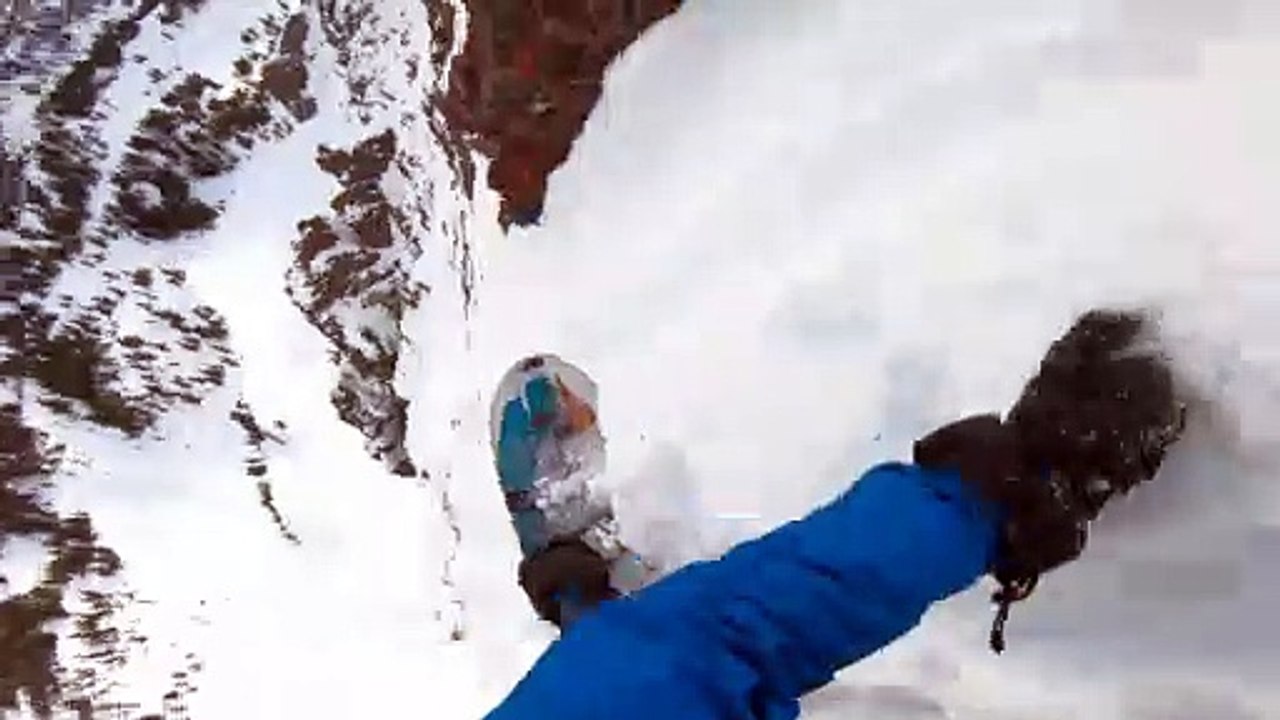 Daring Decent on Snowboard
