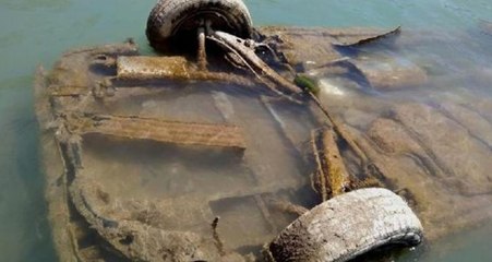 Sular çekilince ortaya çıkan otomobil, jandarma ekiplerini harekete geçirdi