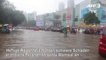 Tải video: Heftige Regenfälle versetzen Mumbai in Ausnahmezustand