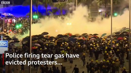 Protesters removed from HK parliament building - BBC News