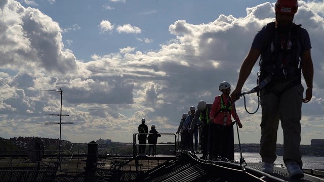 Tourists take a tour of Stockholm's rooftops