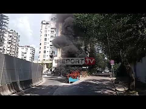 Report TV -Flakë e tym pranë 'Arenës Kombëtare', digjet kazanët e mbeturinave