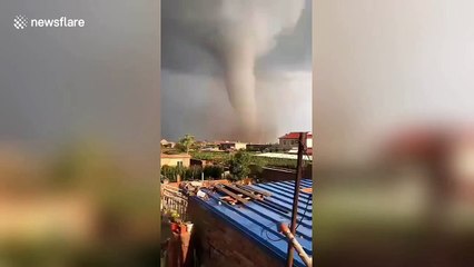 Scary moment violent tornado leaves trail of destruction in China's Kaiyuan