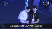 Baidu CEO has water poured on his head during speech