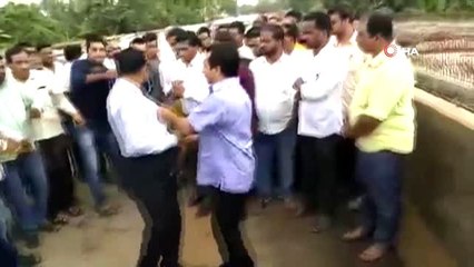 - Mühendisin başından aşağı çamur boşaltan Hintli vekil gözaltına alındı