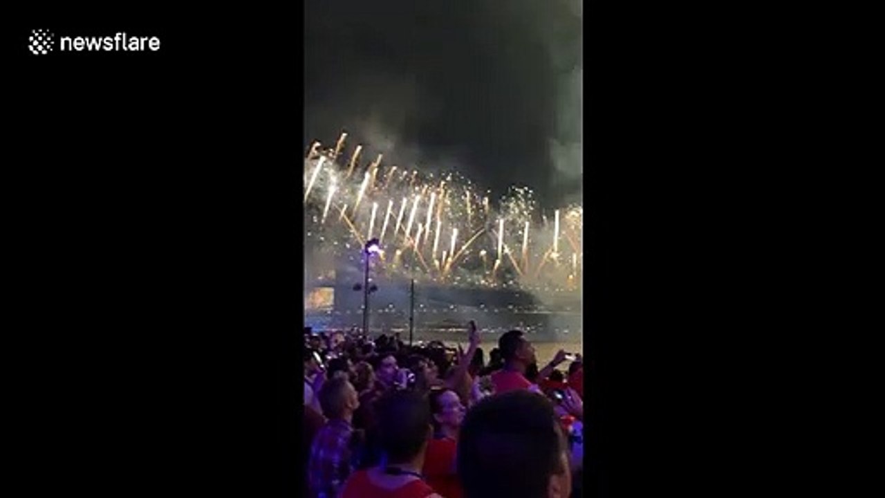 Massive crowd gazes at fireworks during Macy's 4th of July spectacular show