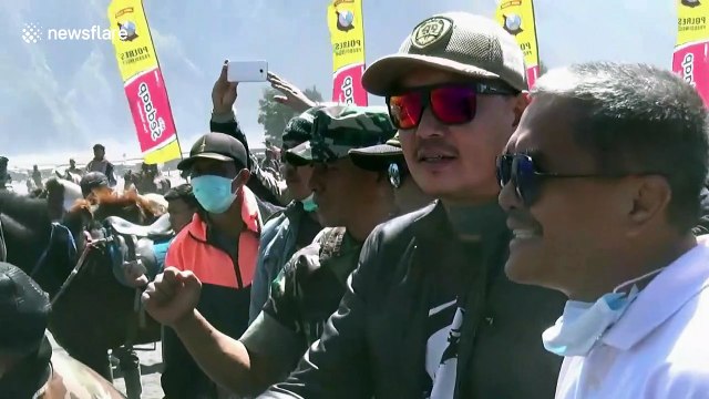 Hundreds of riders take to the sandy plains below Mount Bromo to race their horses