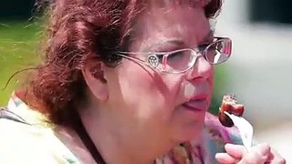 A reverse video of people eating food at summerfest