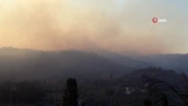 İzmir’in Seferihisar ilçesinde orman yangını başladı İzmir Orman Bölge Müdürlüğü ekipleri, büyük yangına 9 helikopter ve 25 arazöz ile müdahale ediyor. Rüzgarın, ekiplerin çalışmasını güçleştirdiği bildirildi.