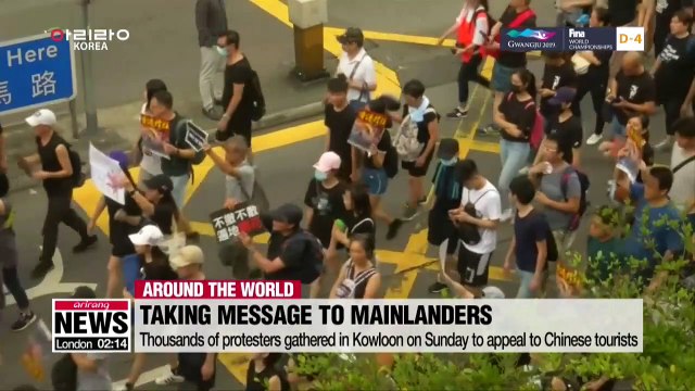 Hong Kong protesters take to Kowloon to take message to mainland Chinese