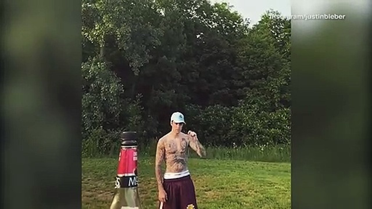 Justin Bieber wins bottle cap challenge and nominates Tom Cruise