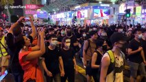Hong Kong protestors block major roads in Kowloon, forcing motorists to turn around