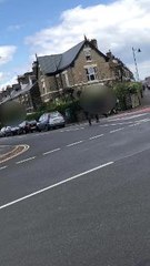 Men fleeing car on Stafford Road