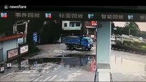 Chinese cyclist escapes serious injury after being run over by truck in China