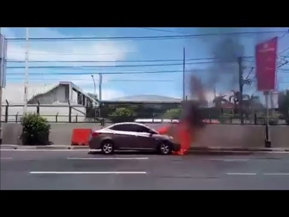 Sedan catches fire on Edsa