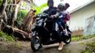 Indonesian motorcyclist fails maneuvering past HUGE millipede and crashes