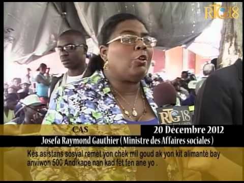 Kès asistans sosyal remèt yon chèk mil goud ak yon kit alimantè bay anviwon 500 andikape nan kad