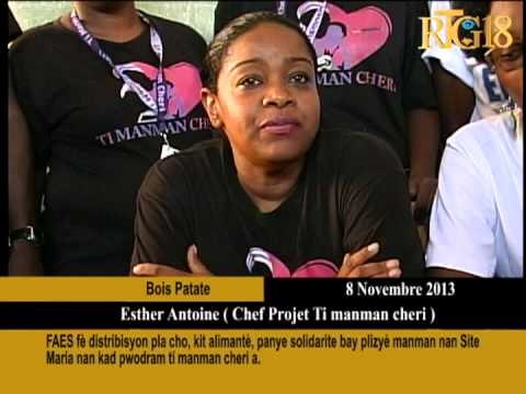 FAES fè distribisyon pla cho, kit alimantè, panye solidarite bay plizyè manman nan Site Maria