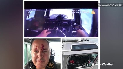 Amazing footage as boat windshield shatters from wave force caused by Barry