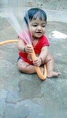 So sweet baby play with water