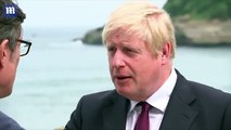 UK PM compares finding hole in a rock to finding a way through Brexit