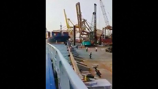 Container ship crashes into gantry crane in Indonesia
