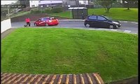 Woman caught on film kicking dog