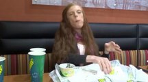 Woman eats subway