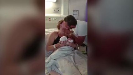 Newborn helps dad propose