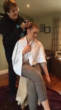 Laura shaves her locks for charity
