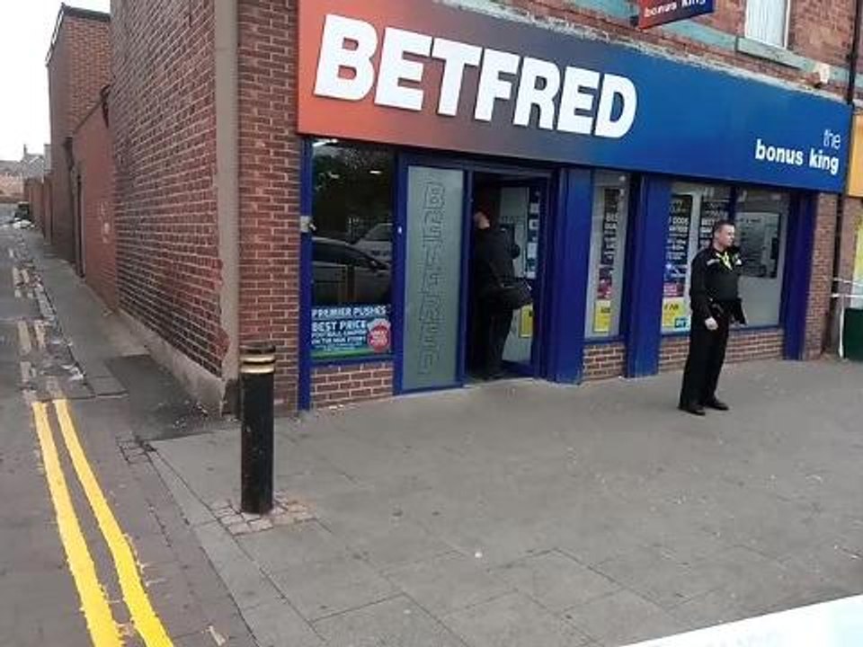Police on scene at Betfred robbery.