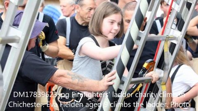 Firefighters ladder climb