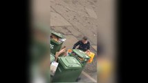 Women going through people's bins