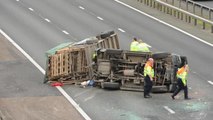 The M6 northbound is closed after a collision involving an overturned car.