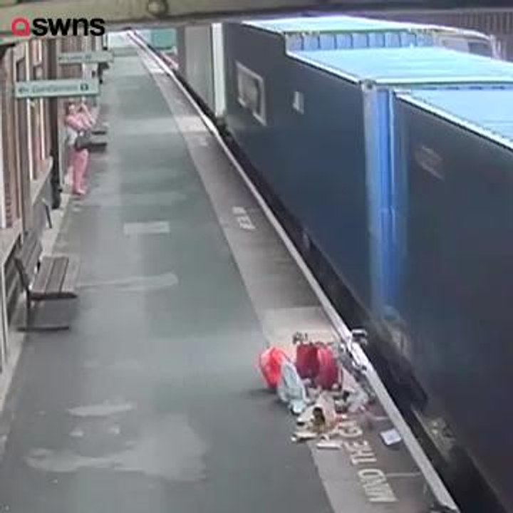 This is the shocking moment an empty child?s buggy was ripped apart when it rolled across a railway platform and into the path of an oncoming train.